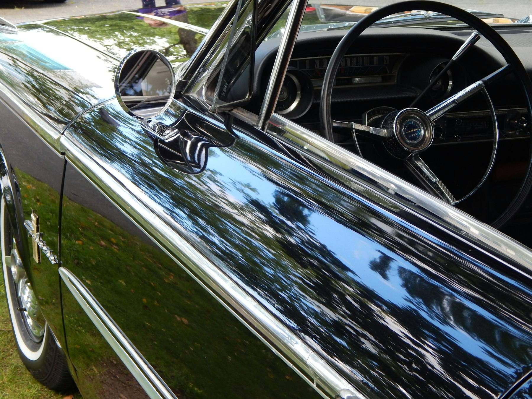 Classic car with polished chrome and gleaming paint